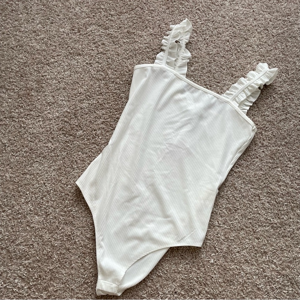 White ruffle bodysuit